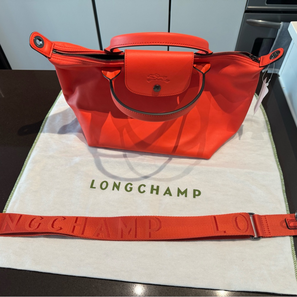 NWT longchamp Le Pliage orange leather